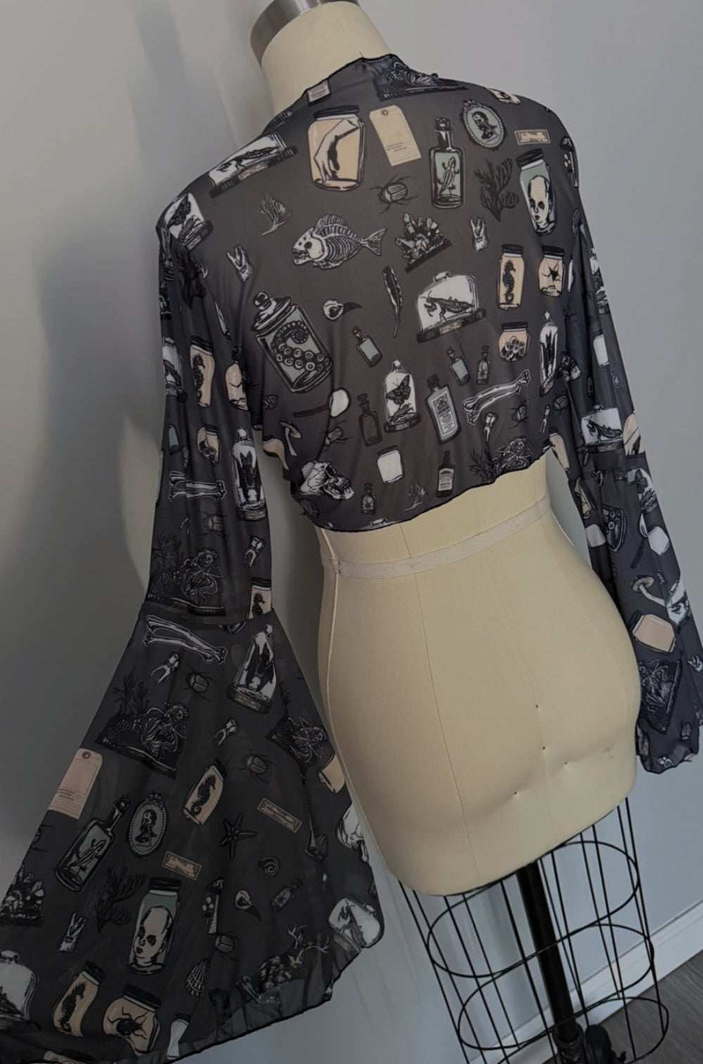 Oddities Tie Top